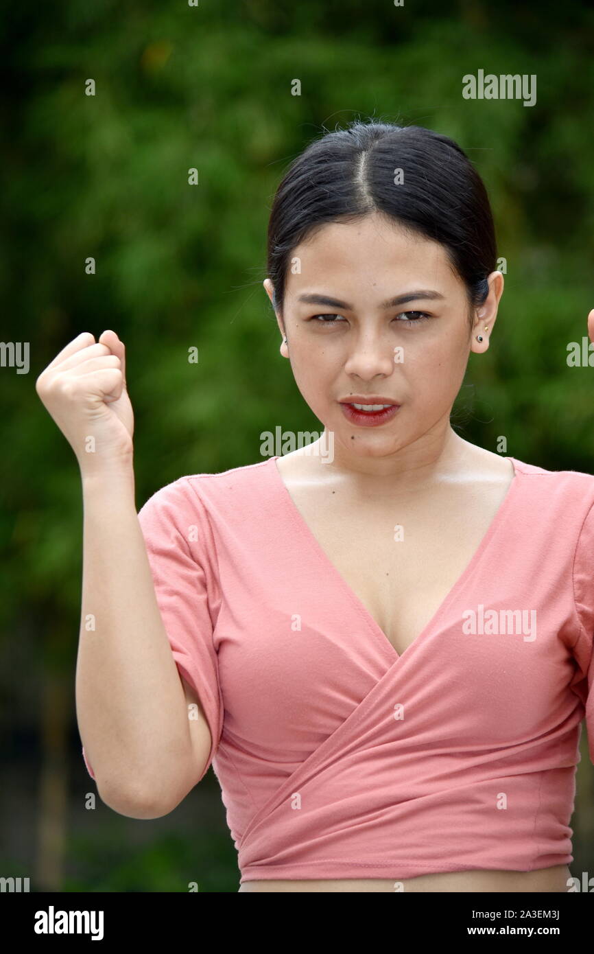 Eine verärgerte asiatische Frau Stockfoto
