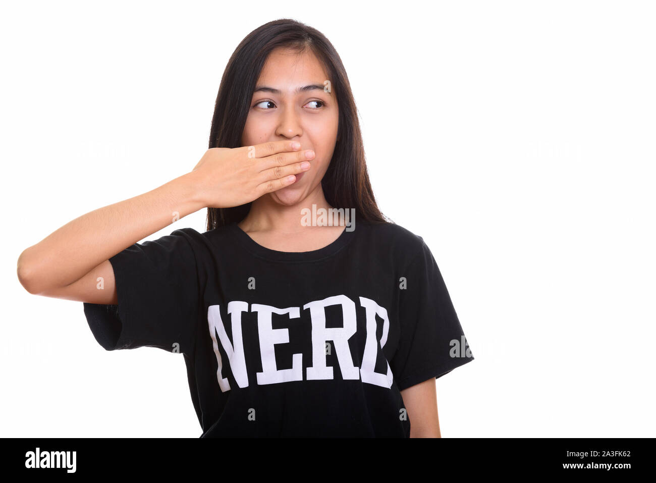 Studio geschossen von jungen asiatischen Teenager nerd Mädchen für Mund Blick Stockfoto