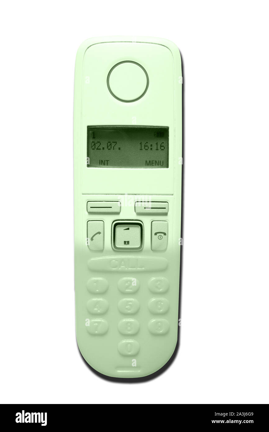 Bild von DECT-Telefon in ein Spielzeug Telefone auf weißem Hintergrund. Das Konzept der Technologieveralterung. Trendy mint Farbe. Stockfoto