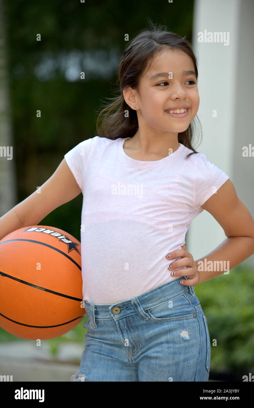 Eine weibliche Basketballspieler und Glück Stockfoto