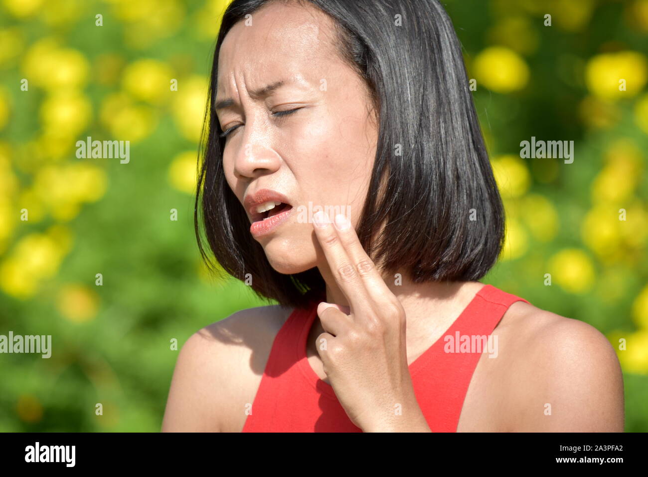 Frau mit Zahnschmerzen Stockfoto