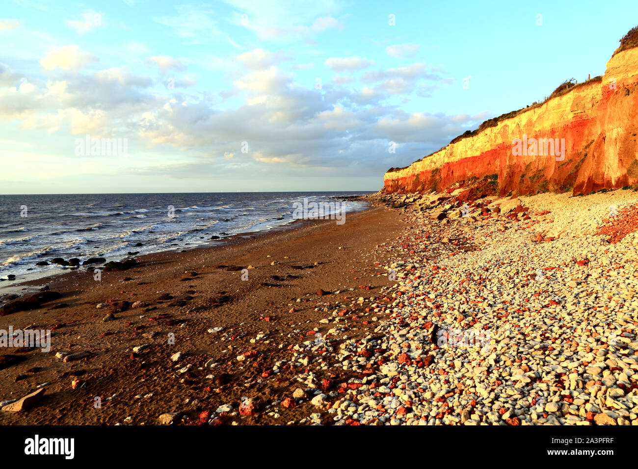 Old Hunstanton, gestreifte Felsen, Strand, Wash, Nordsee, Norfolk, England. Stockfoto