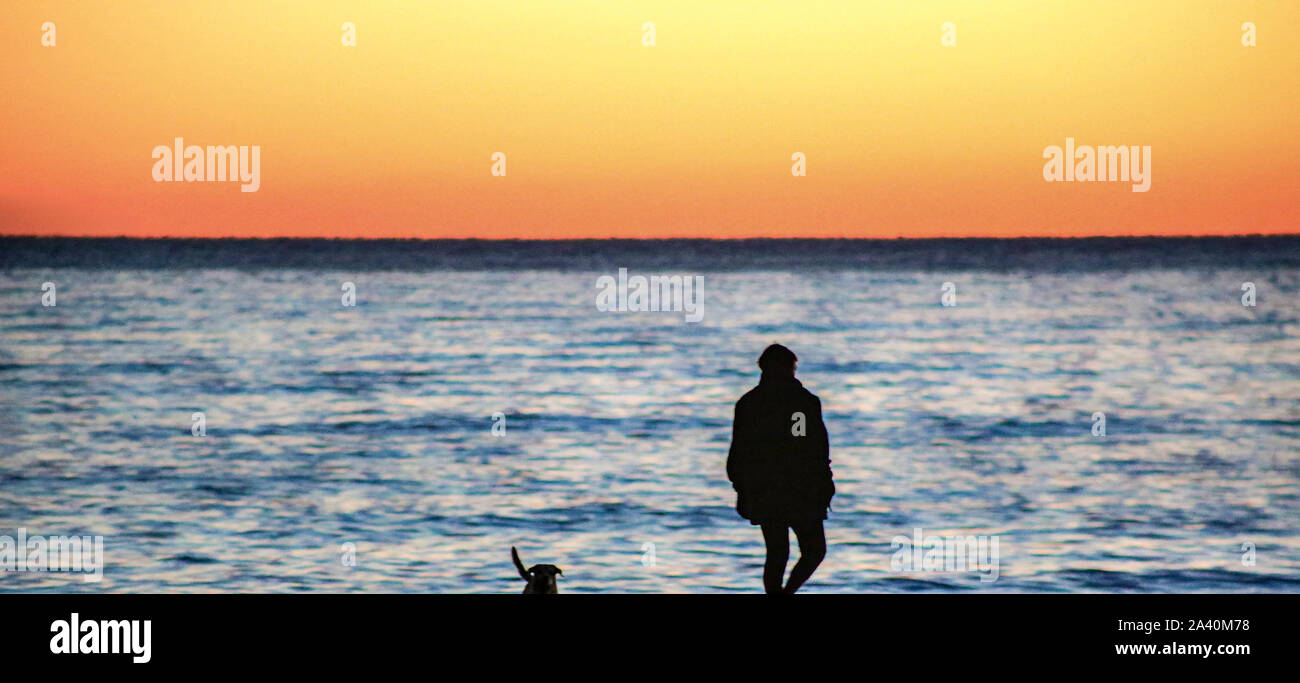 Silhouette am Strand Stockfoto