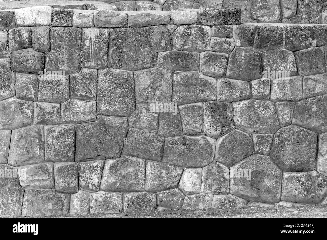 Natürliche graue und braune Stein Ziegel Hintergrund Wandfläche, Fragment der Ruinen der alten Inkas in Peru in Südamerika. Hintergrund mit Kopie spac Stockfoto