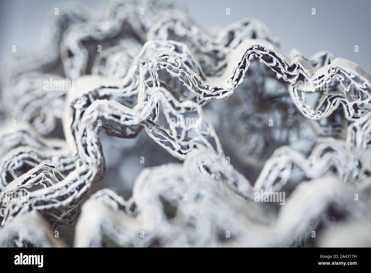 Zusammenfassung Hintergrund aus geschredderten Karton, selektiver Fokus, Farbe Tonen angewendet. Stockfoto