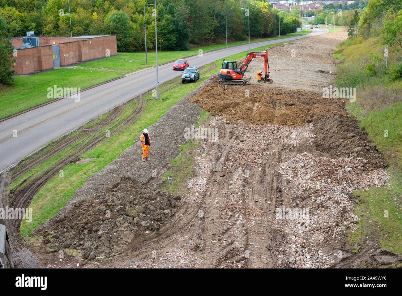 Milton Keynes Gebäude des Rates Erdarbeiten genannt Bundesanleihen neben Straßen, um zu verhindern, dass unbefugte Zeltdörfer. Stockfoto
