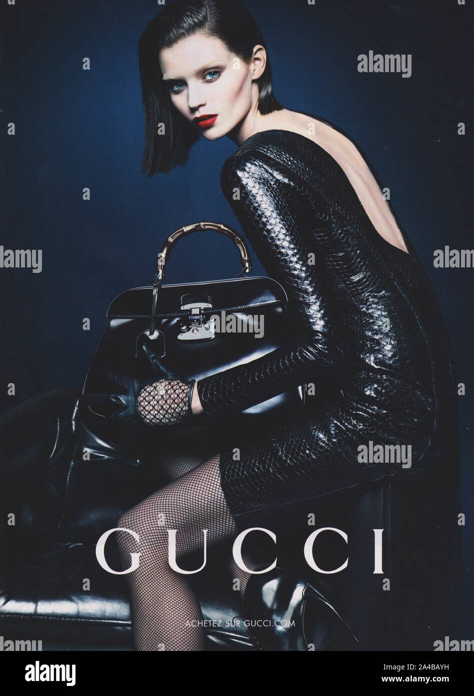 Plakat werbung GUCCI Fashion House mit Abbey Lee Kershaw in Papier Magazin von 2013 Jahr, Werbung, kreative GUCCI Anzeige von 2010 s Stockfoto