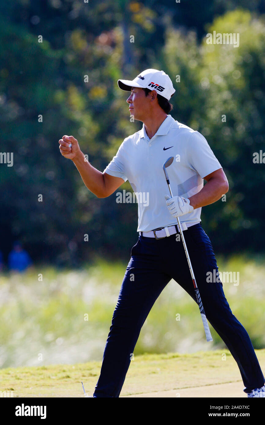 Houston, USA. 13 Okt, 2019. Zhang Xinjun von China feiert während der 2019 Houston Open Golfturnier in Houston, USA, Okt. 13, 2019. Credit: Song Qiong/Xinhua/Alamy leben Nachrichten Stockfoto