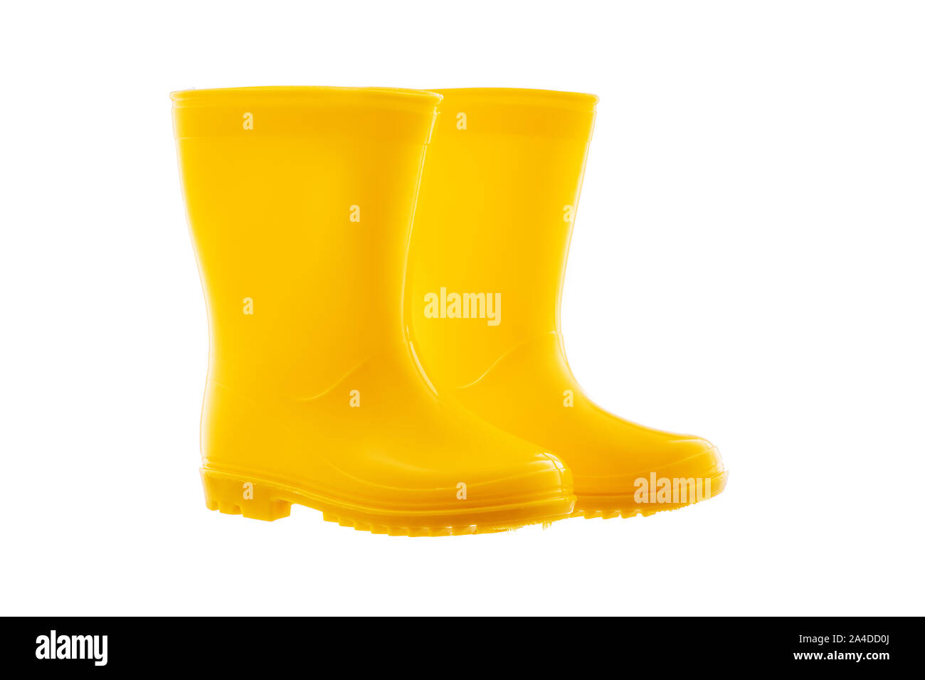 Gelber Gummi regen Stiefel für Kinder auf weißem Hintergrund Stockfoto