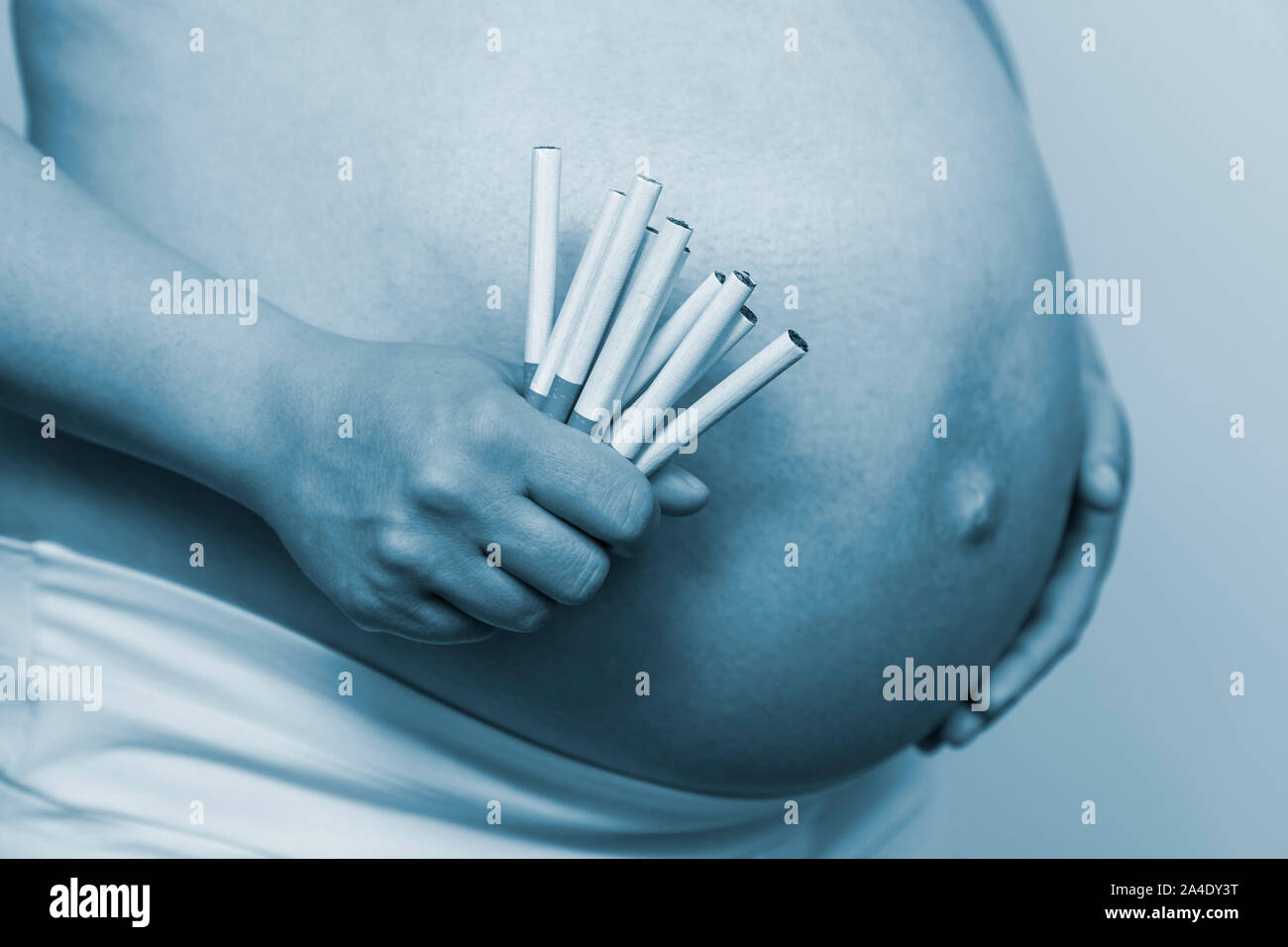 Rauchen während der Schwangerschaft Symbol Foto Stockfoto