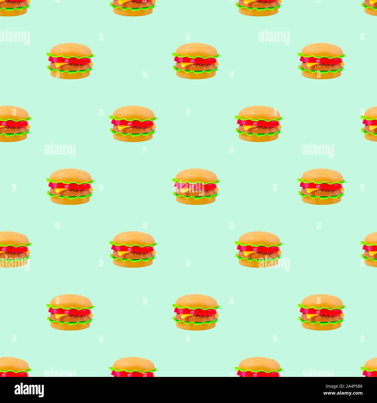Fast food Muster Kunststoff Burger auf einem blauen mint Hintergrund. Modern isometrische Muster Stockfoto