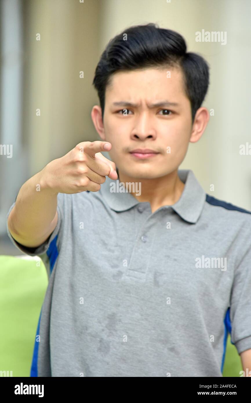 Chinesische Teenager männlichen Zeigen Stockfoto