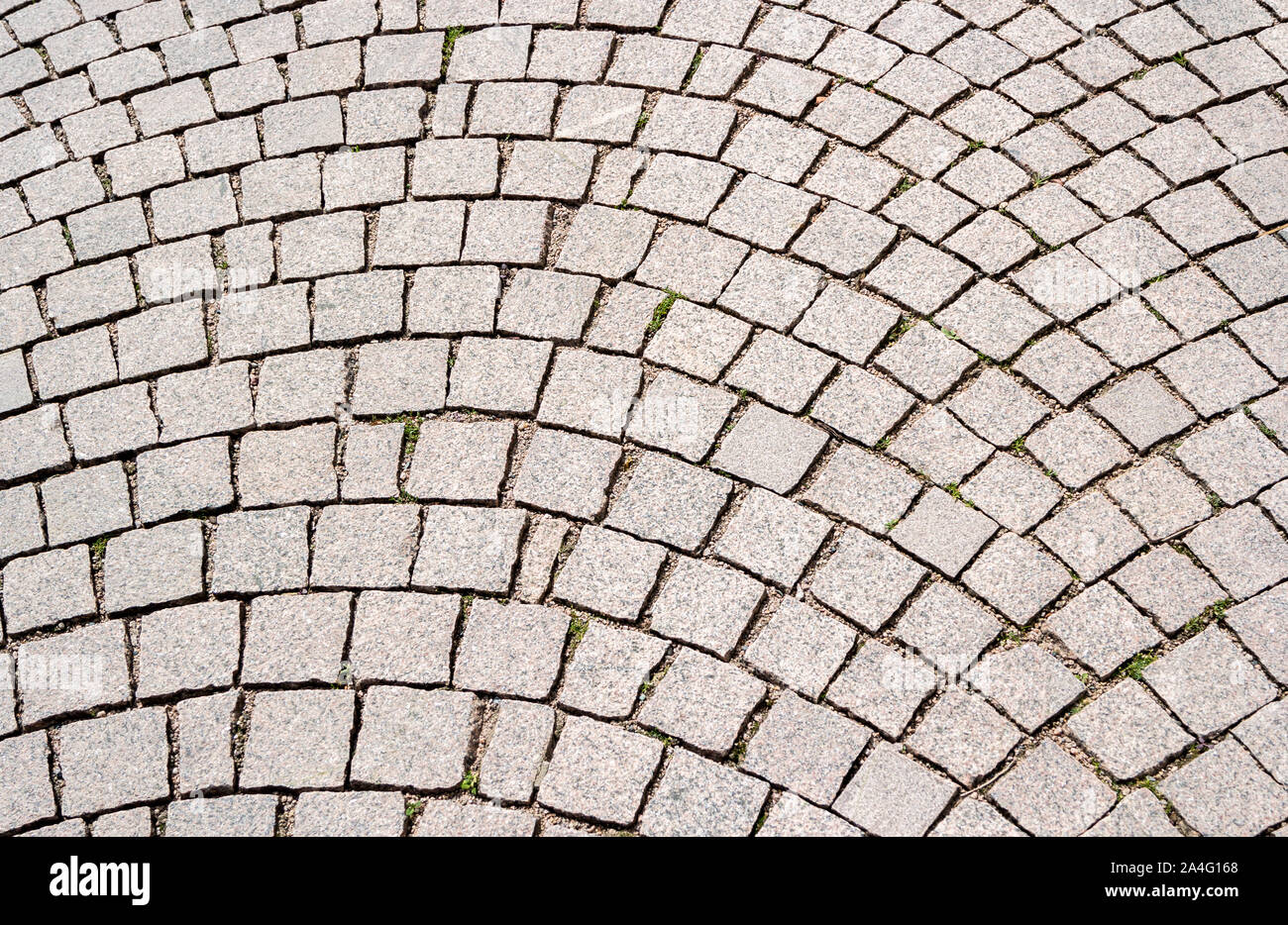 Straße mit grauem Kopfsteinpflaster Textur Stockfoto
