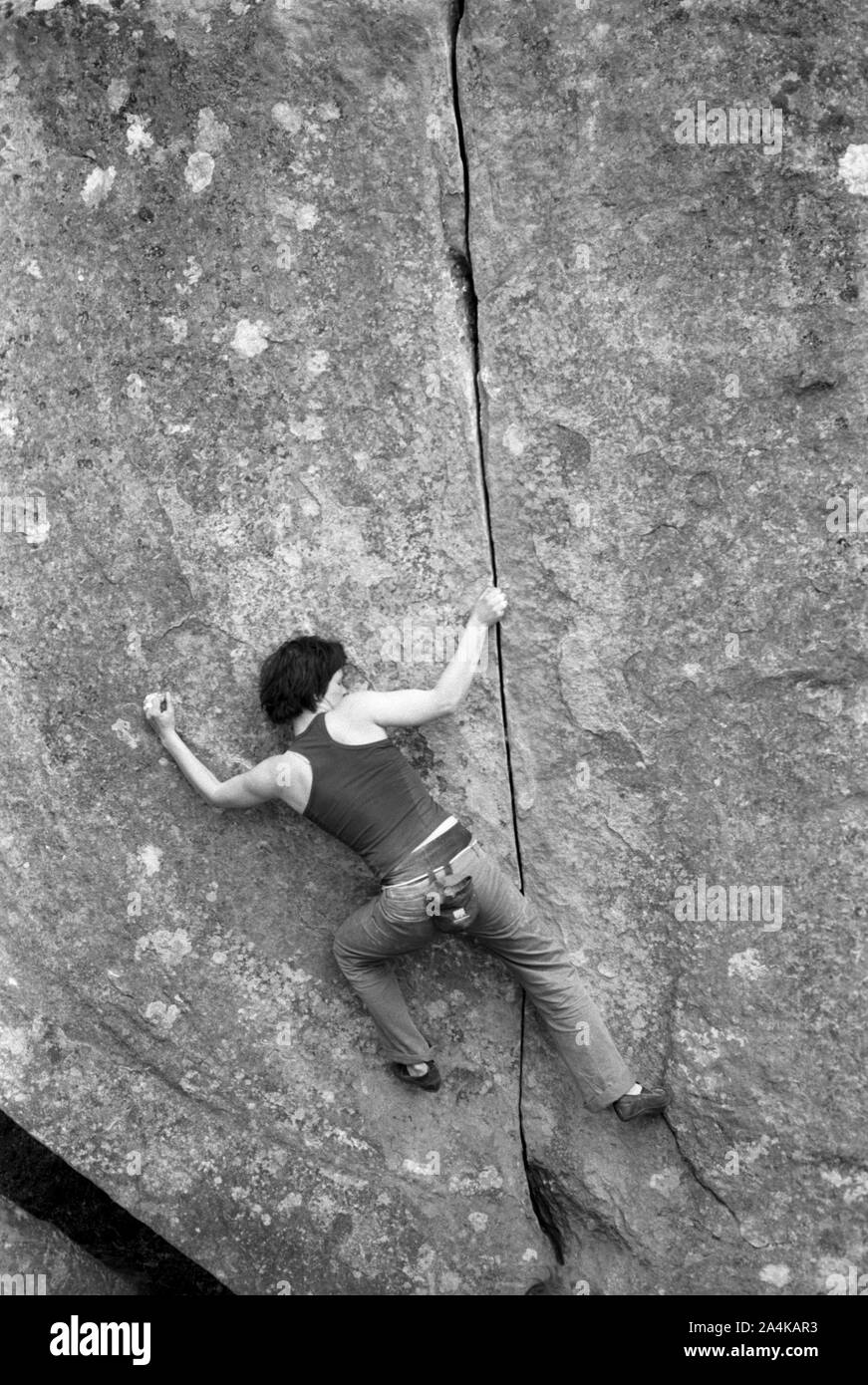 Man Klettern ein Rock Stockfoto