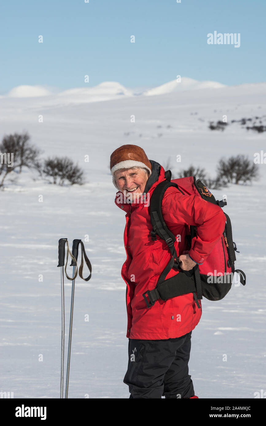 Ältere Frau Langlauf Stockfoto