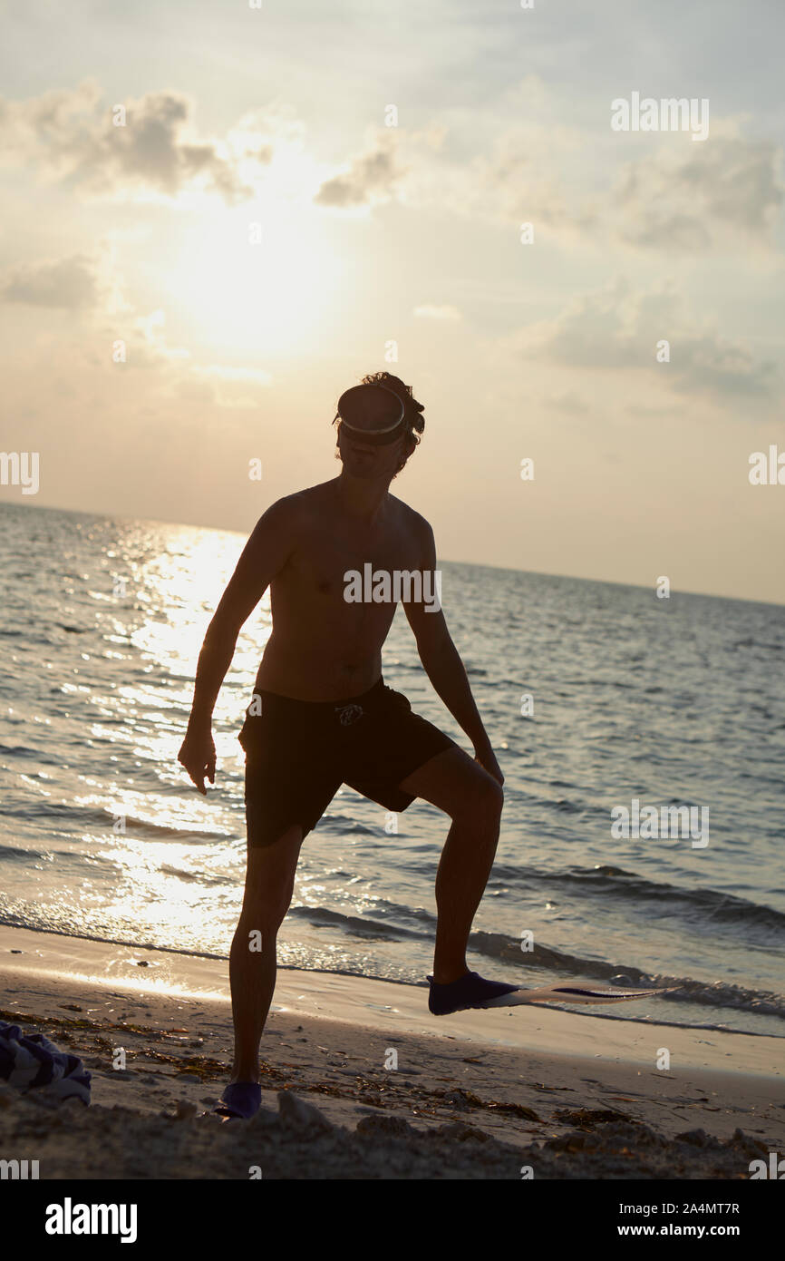 Mann am Strand Stockfoto