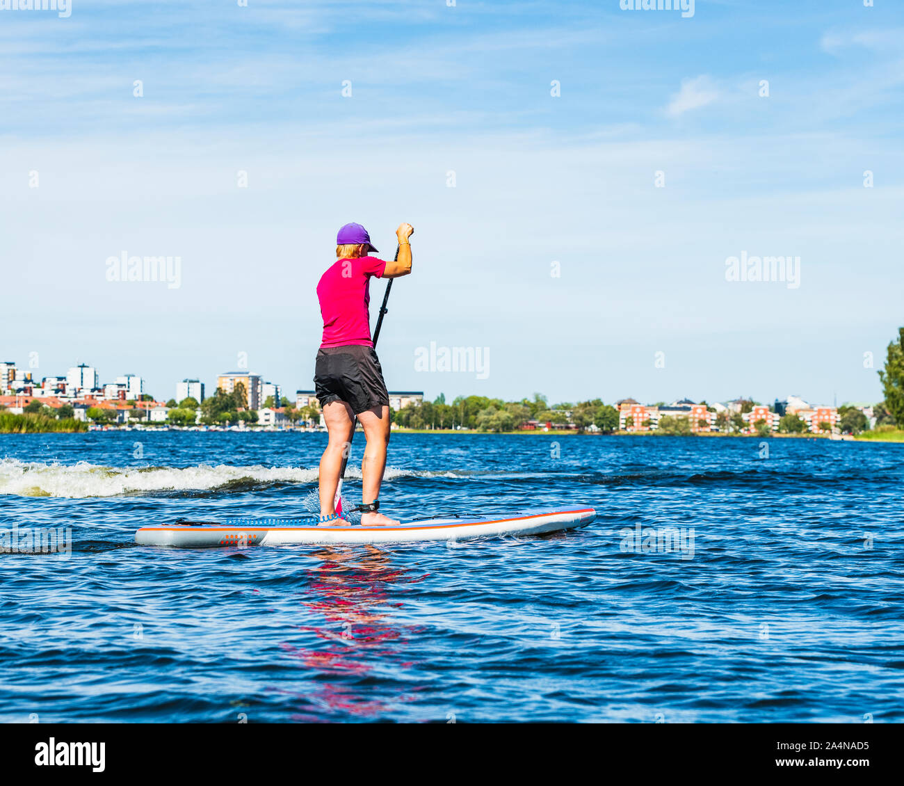 Mann auf paddleboard Stockfoto