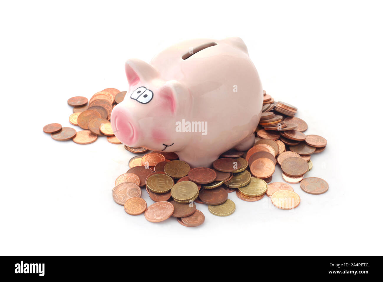 Sparschwein mit Euro Münzen isoliert auf weißem Stockfoto