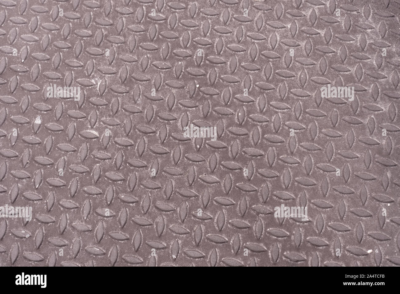 Graues metall Textur mit sich wiederholenden Blatt Designs Stockfoto