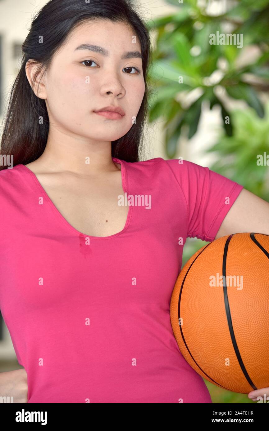 Eine Emotionslose chinesische Sportlerin Stockfoto