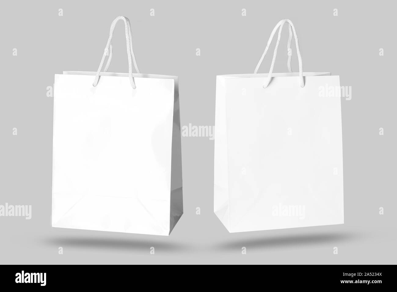 Mockup Papier Shopping Bag auf grauem Hintergrund Stockfoto