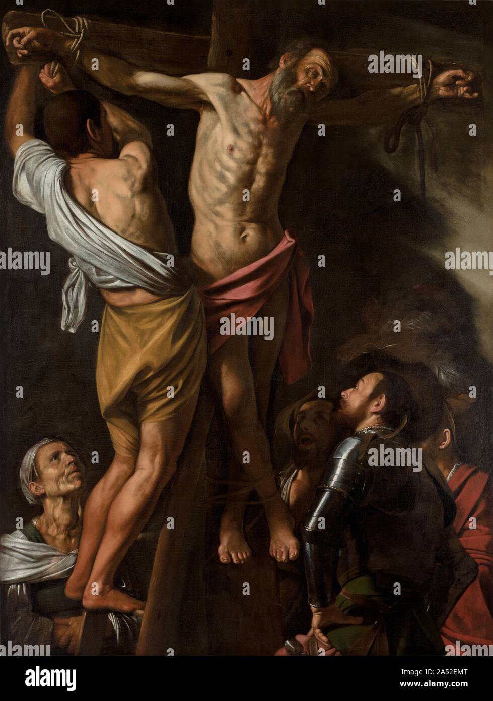 Die Kreuzigung des hl. Andreas, 1606-7. Saint Andrew's Bemühungen, das Christentum nach Griechenland im ersten Jahrhundert N.CHR. eingeführt wurden mit Feindseligkeit von lokalen Behörden erfüllt. Er wurde verurteilt, um am Kreuz zu sterben, weil er sich weigerte, die heidnischen Götter zu bestätigen. Für zwei Tage, Andrew von Station seiner Märtyrer zu einer zunehmend sympathisch Menschenmenge predigte. Rücksichtnahme auf öffentliche Nachfrage, Andrew &#x2019;s Würde - Henker versuchte, ihn zu lösen, aber ihre Hände waren auf mysteriöse Weise gelähmt ist. Andrew &#x2019;s Wunsch nach Martyrium war damit erfüllt und er starb im göttlichen Licht eingehüllt. Caravaggio Stockfoto