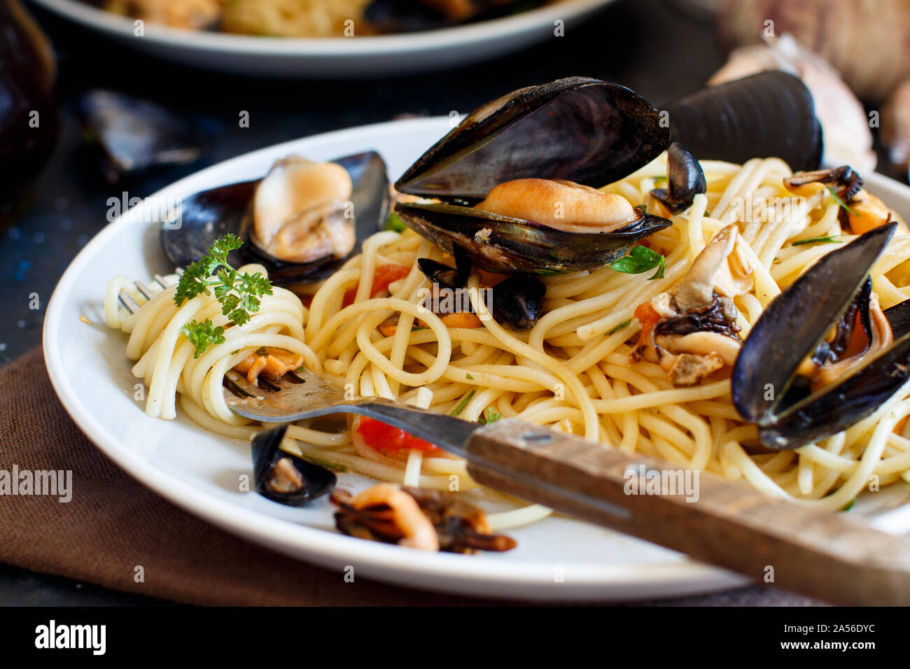 Spaghetti mit Muscheln und Tomaten italienisch Meeresfrüchte pasta Close up Stockfoto