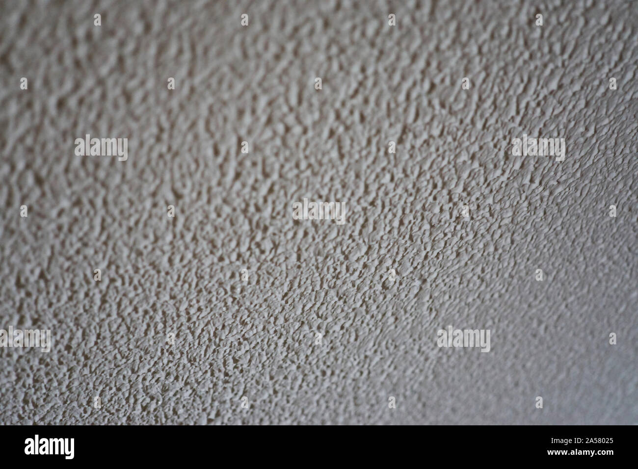 BAcvkground Textur mit einer Wand mit geprägtem Lackierung, Bilder mit schmalen Bereich der Fokus Stockfoto