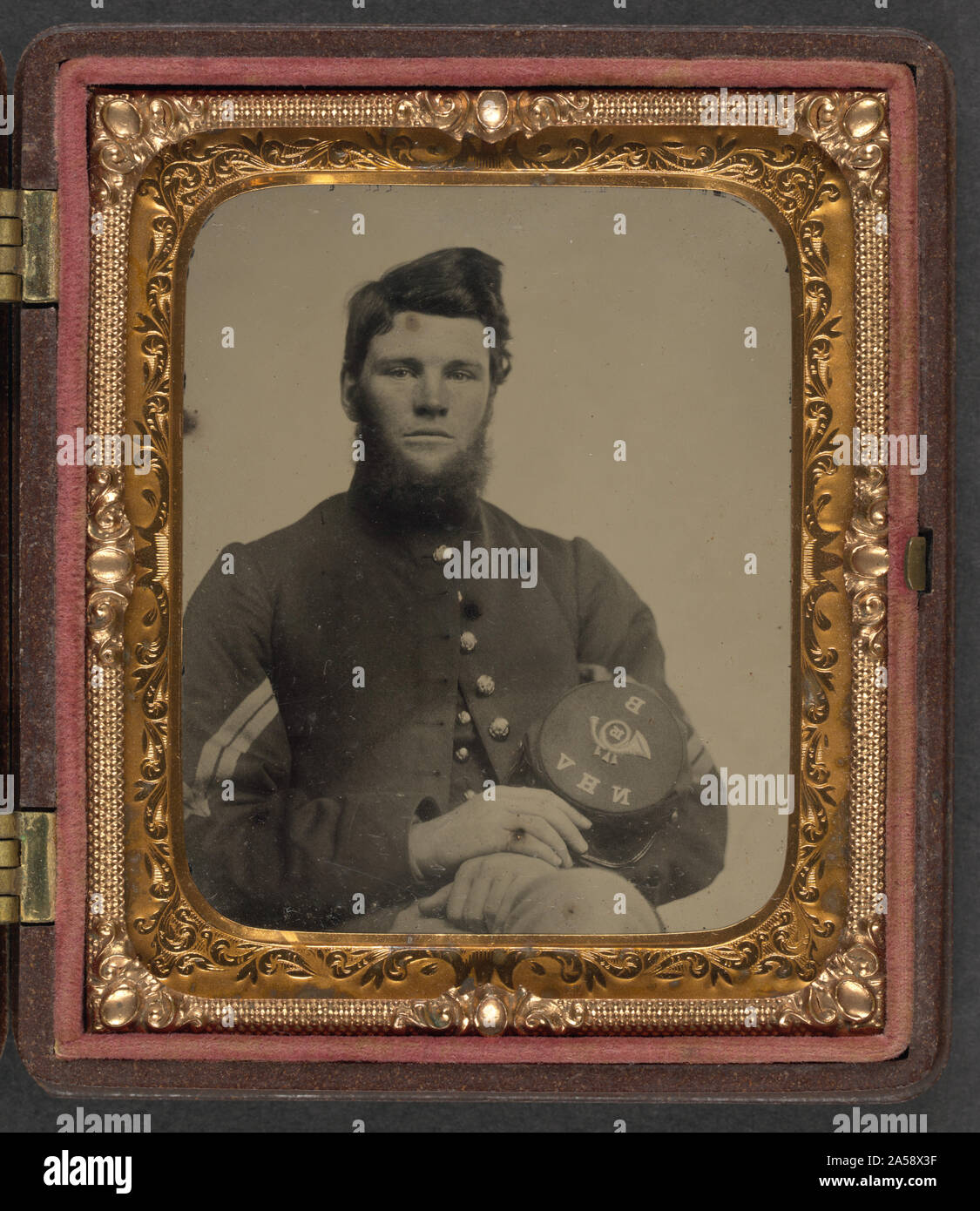 Unbekannter Soldat in der Union Corporal einheitliche Holding B, 15 New Hampshire Freiwillige kepi Stockfoto