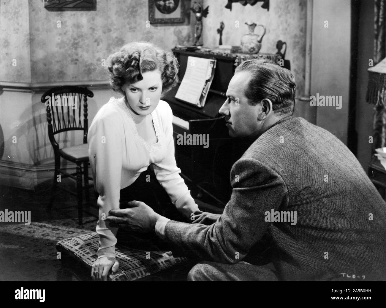 MAUREEN O'Hara und MELVYN DOUGLAS IN EINER FRAU GEHEIMNIS (1949) von Nicholas Ray geleitet. Credit: RKO RADIO/Album Stockfoto