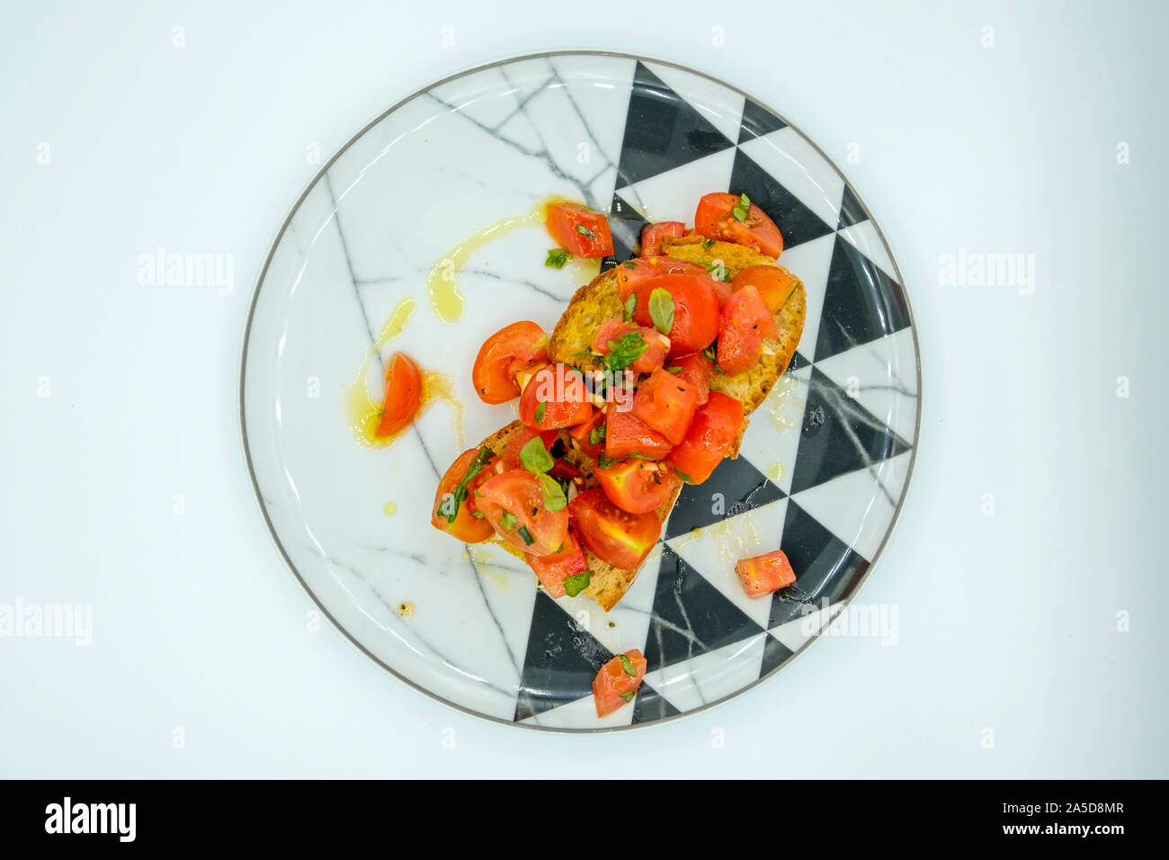 Bruschetta mit gehackten Tomaten Stockfoto