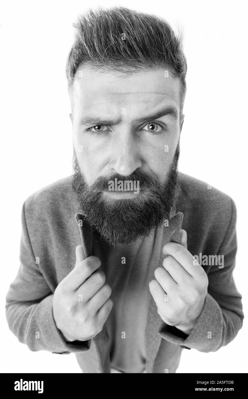 Kein Mensch ist stilvoll geboren. Stilvolle hipster tragen elegante Jacke mit lässigen Jeans. Bärtiger Mann mit modischen Haarschnitt. Kaukasische Kerl mit stilvollen Schnurrbart und Bart Haar Form auf Unrasierten Gesicht. Stockfoto