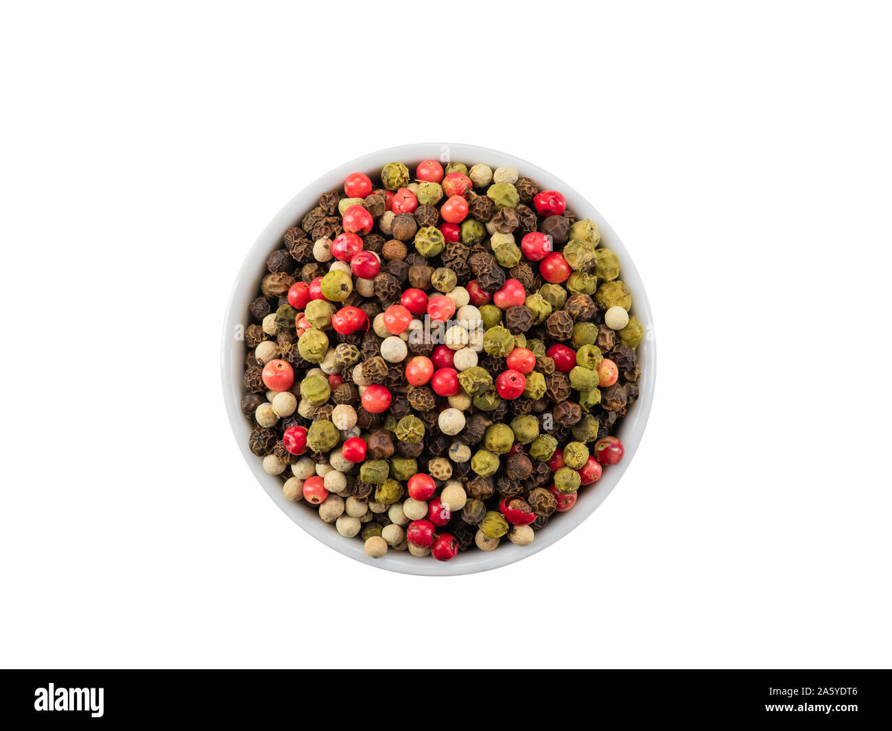 Einige mixtured Pfeffer in einer Schüssel auf weißem Hintergrund mit Kopie Platz für Text oder Bilder isoliert. Gewürze und Kräuter. Essen, Kochen, Restaurant, Pack Stockfoto