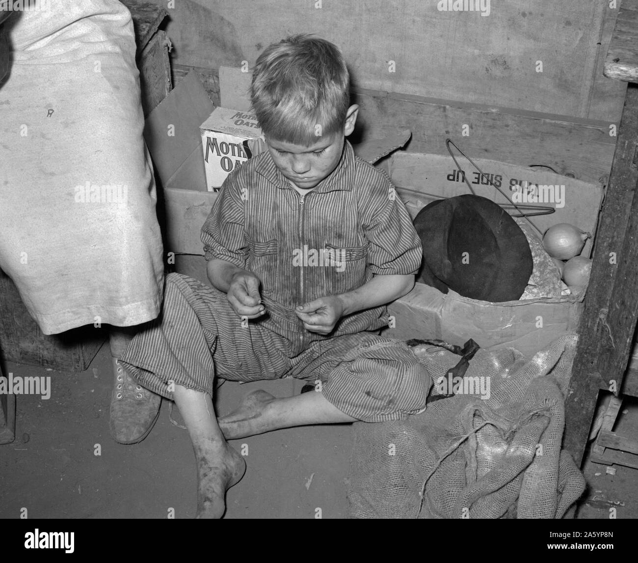 Der Sohn des weißen Wanderarbeitnehmer im Zelt in der Nähe von Harlingen, Texas von Russell Lee 1903-1986, Fotograf 19390101 Feb. Stockfoto