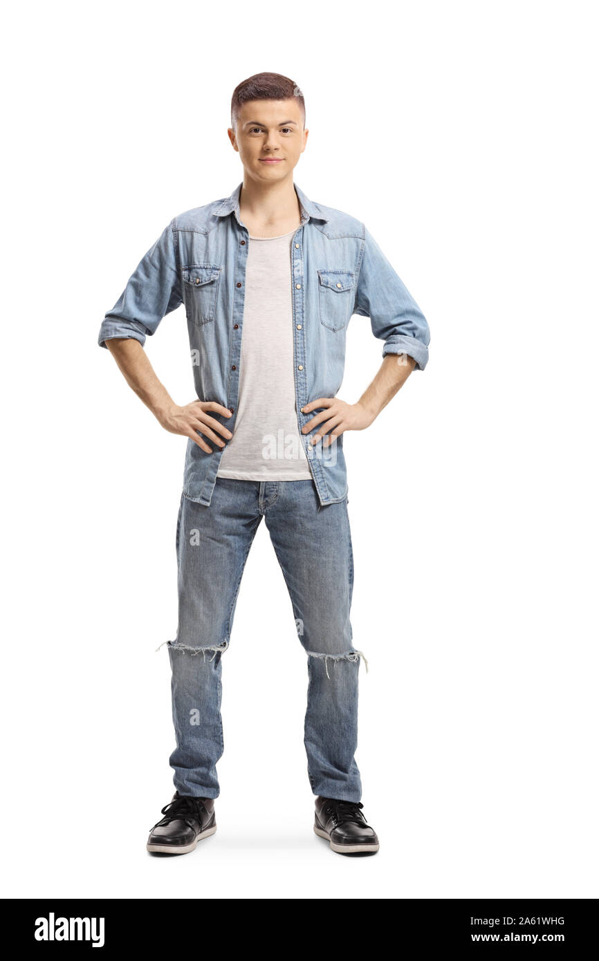 In voller Länge Porträt eines jungen Mann in Jeans posiert auf weißem Hintergrund Stockfoto