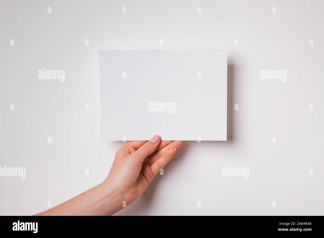Woman's Hand leeres Papier close-up Stockfoto