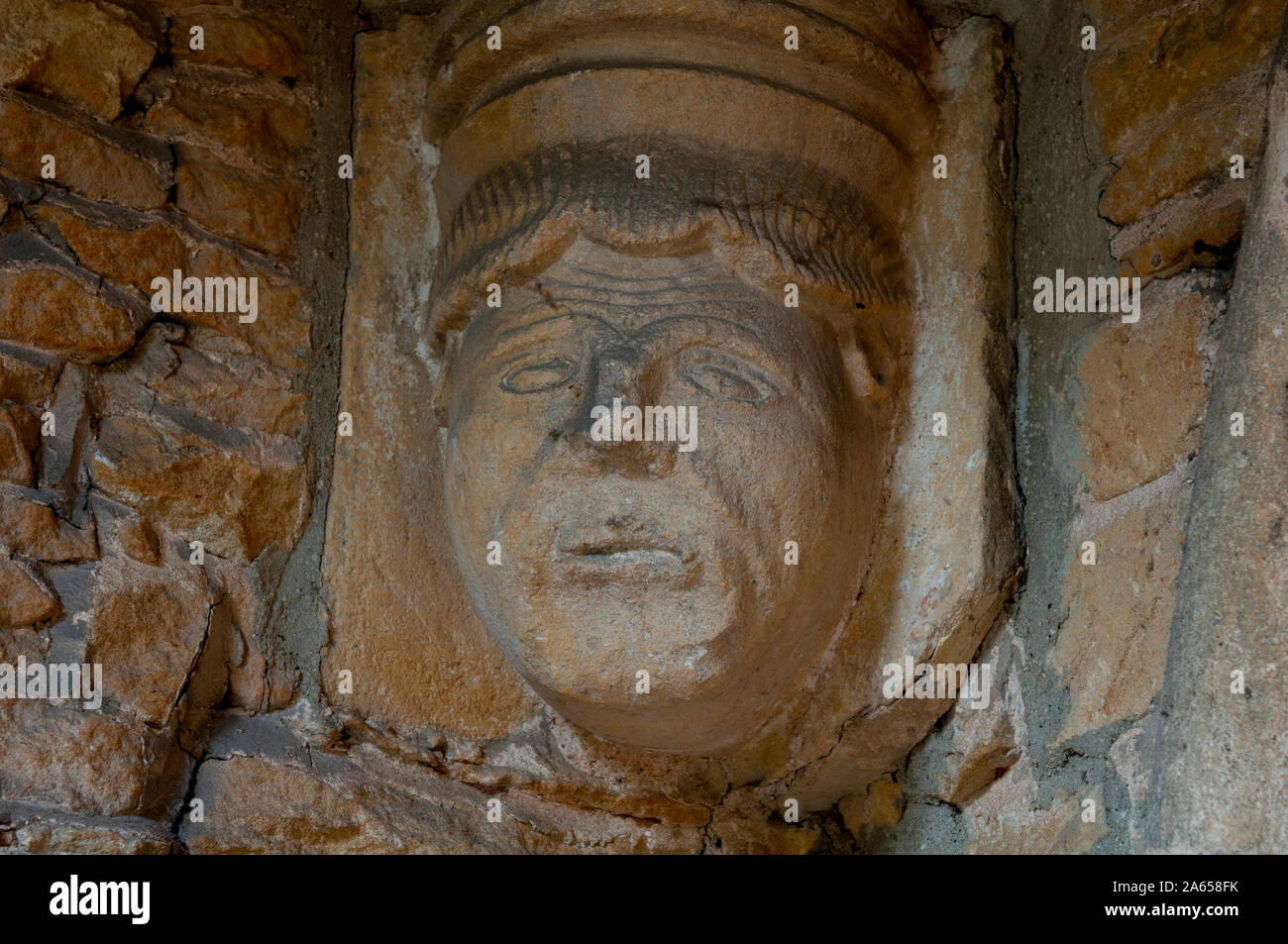 Geschnitzten Kopf im Süden Veranda, St. Kenelm's Kirche, Enstone, Oxfordshire, England, Großbritannien Stockfoto