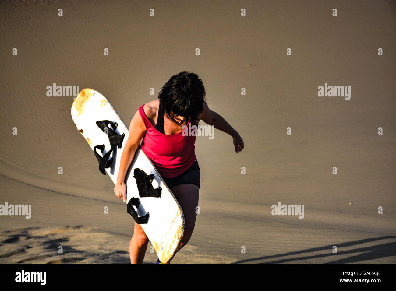 Sandboard in Huacachina, Peru Stockfoto