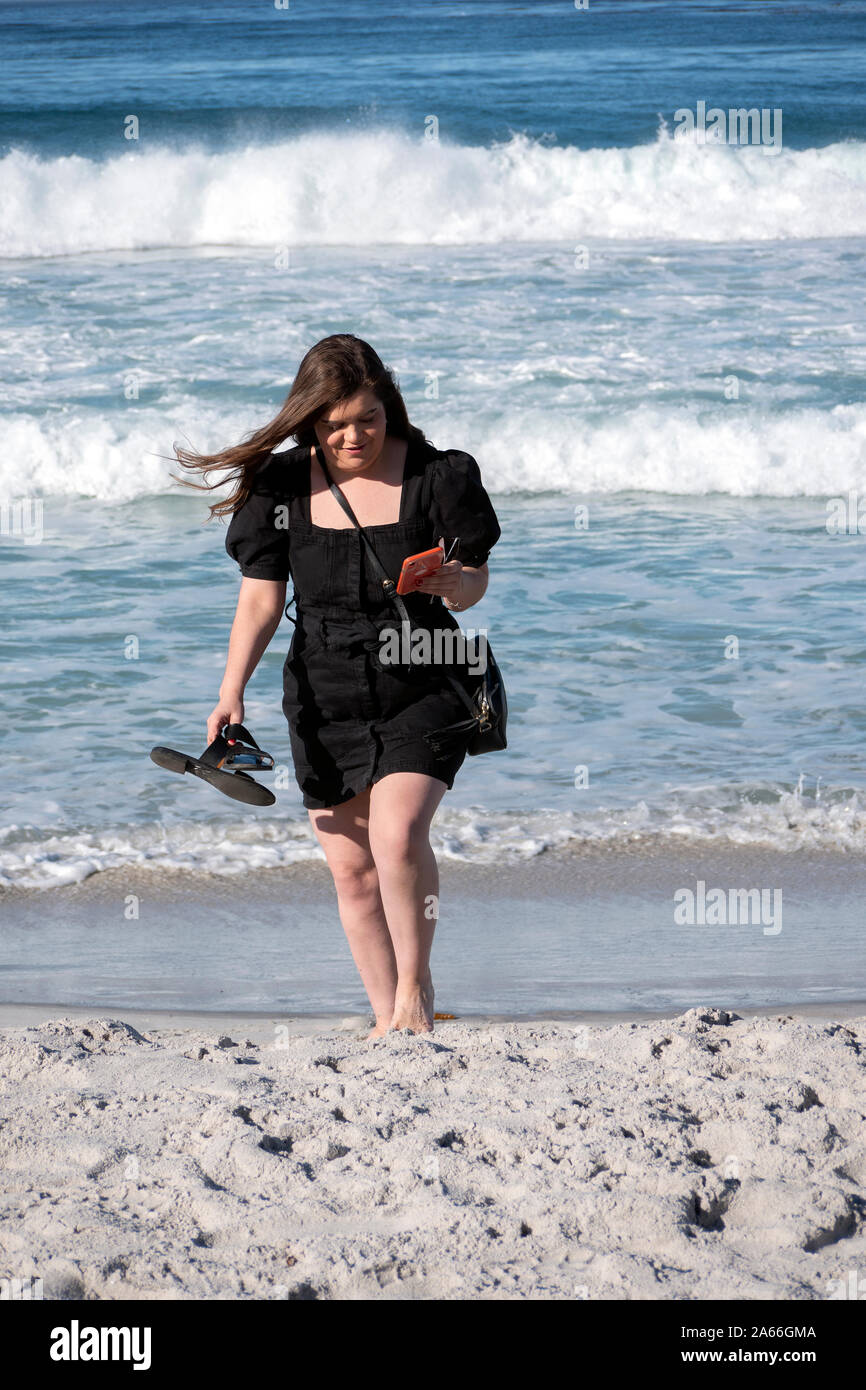 Touristen am Strand von Carmel By The Sea Kalifornien USA Stockfoto