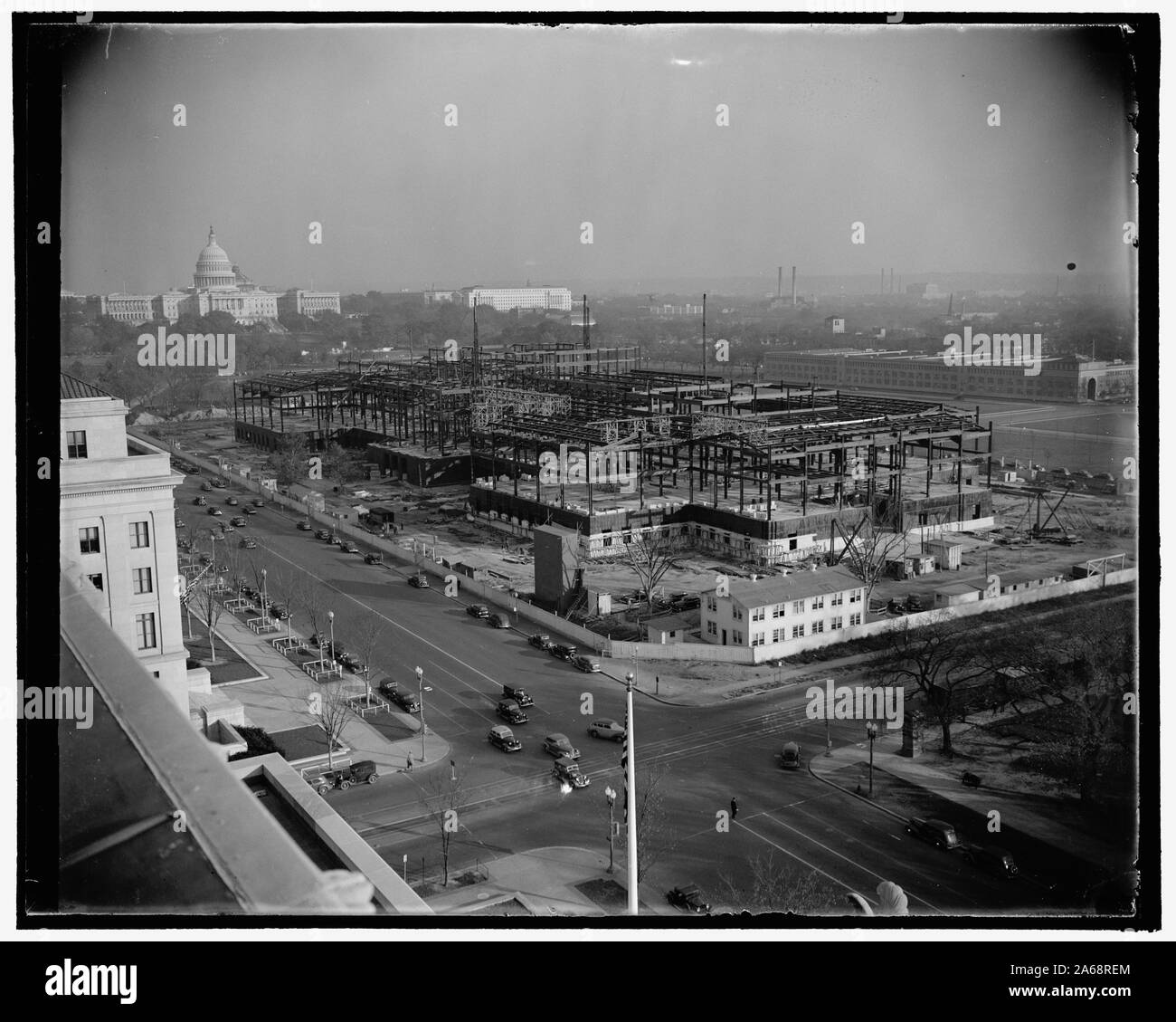 Arbeiten an Mellon's Geschenk an Nationalen Capitol zügig voran. Washington, D.C., 3. Bau der Neuen Nationalgalerie, ein Geschenk der späten Andrew Mellon zu den USA Regierung, rasch voran. Das Gebäude, von dem erwartet wird, zu den schönsten und einer der größten Galerien in der Welt, soll im Jahr 1940 abgeschlossen sein. Es ist an der Mall nur einen Katzensprung von der U.S. Capitol gelegen, 11/3/38 Stockfoto