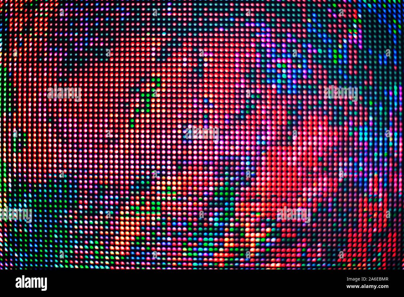 Abstrakte bunte Flecken übersät Textur Hintergrund, viele Rot, Blau, Grün, Schwarz Neon Licht runden Punkte Kulisse, dekorative Blumen Ornament, Muster Stockfoto