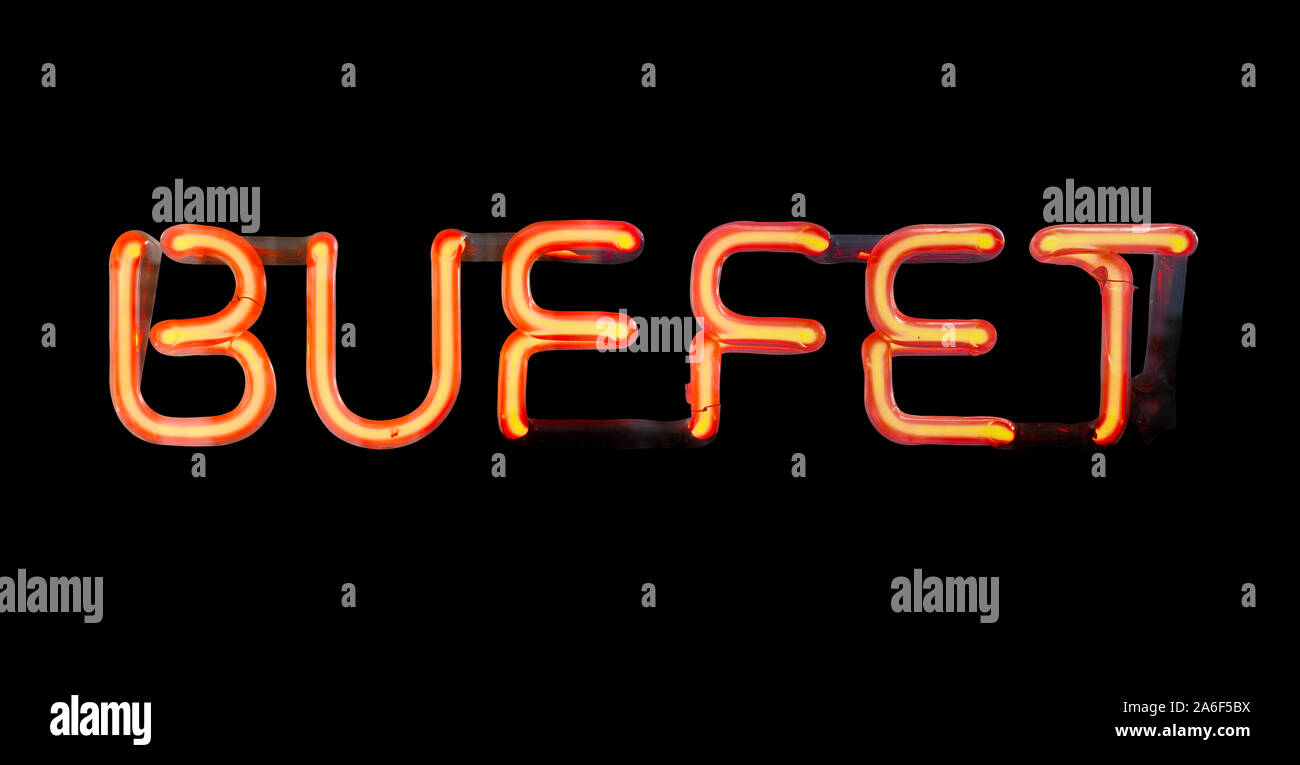 Eine isolierte Leuchtreklame für ein Restaurant Buffet auf schwarzem Hintergrund Stockfoto