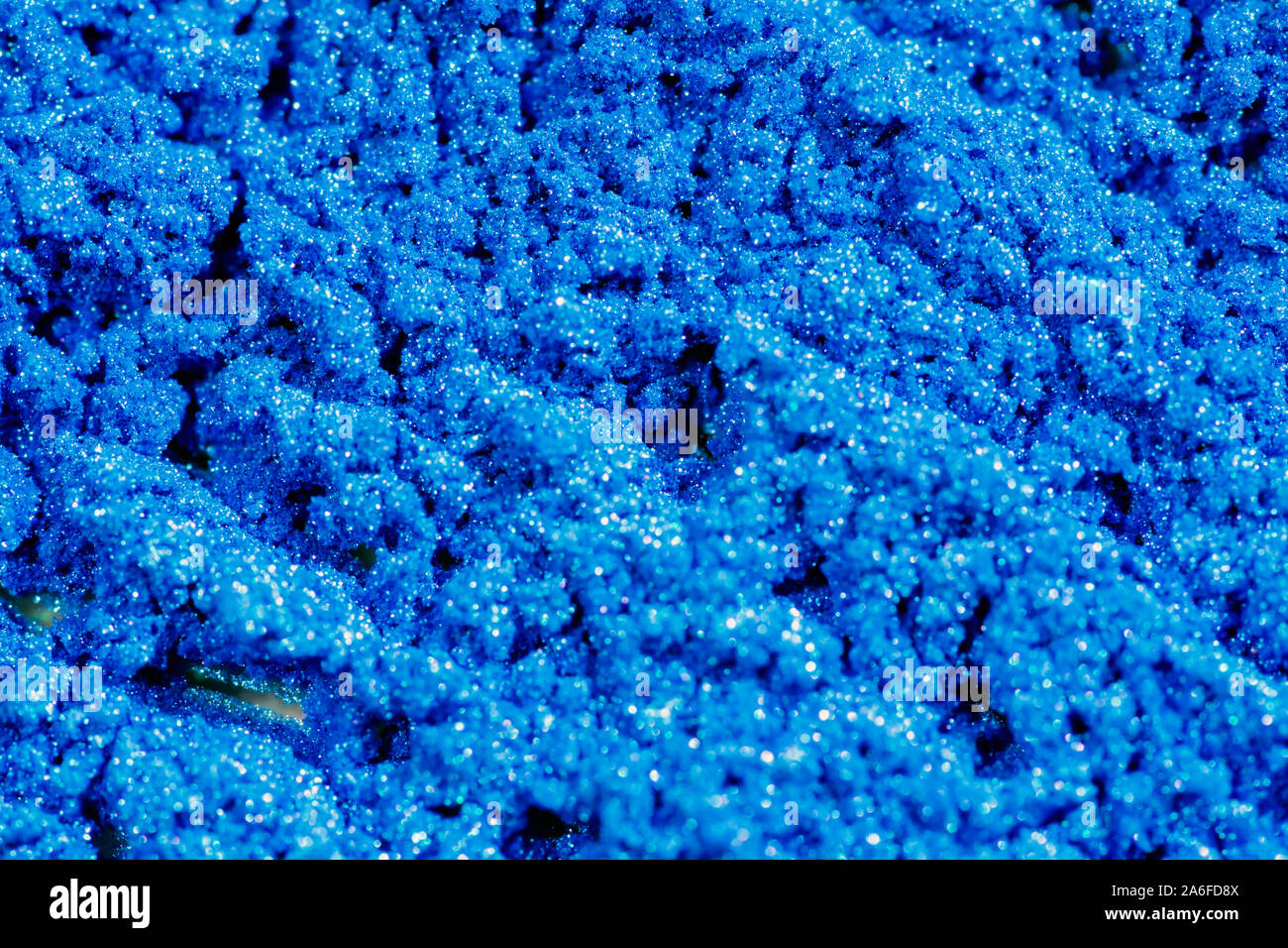 Blue Abstract Background, glänzende blaue Pulver Textur Stockfoto