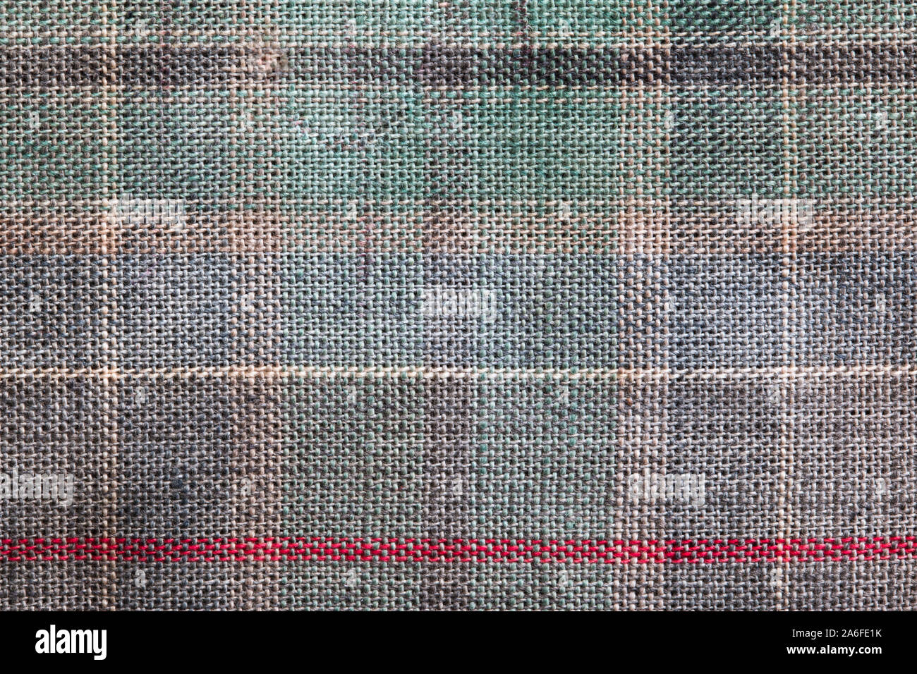 Nahaufnahme von tartan Material, zeigt farbige horizontale und vertikale Linien, und die gewebten Textur des Materials. Stockfoto