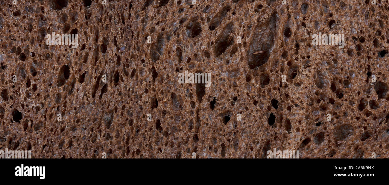 Dunkle organisches Brot ausgefüllt Frame Format Hintergrund Stockfoto