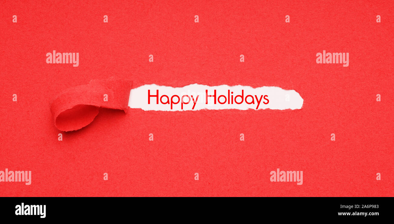 Happy Holidays - abziehbarer rotes Papier Hintergrund Weihnachten zu offenbaren Gruß Stockfoto