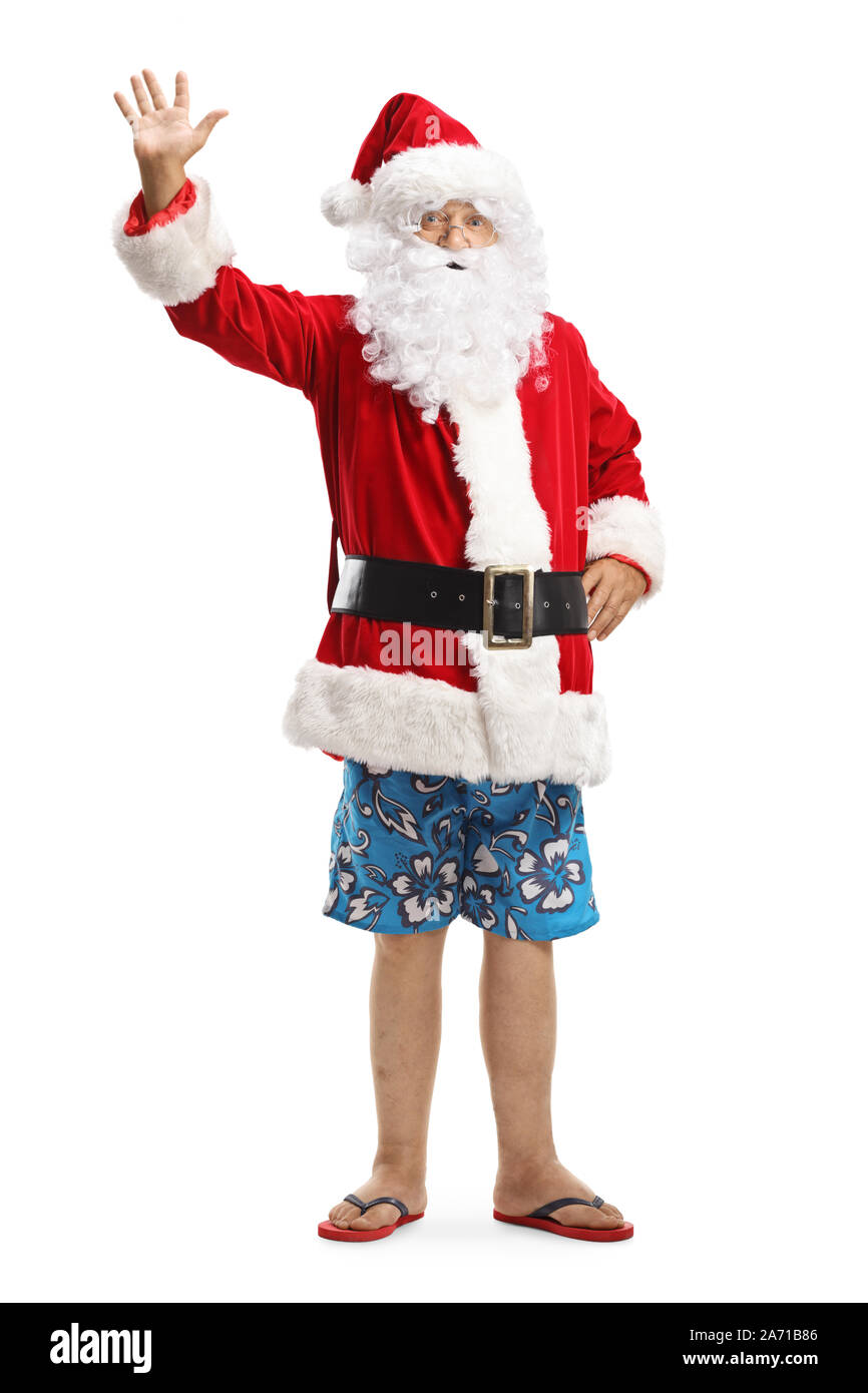 Volle Länge Portrait von Santa Claus im Sommer Shorts und Flip-Flops winken in die Kamera auf weißem Hintergrund Stockfoto