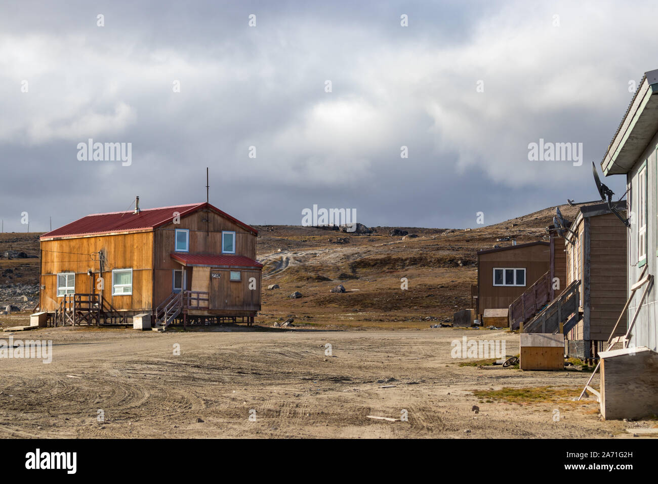 Wohnhäuser in Clyde River, Nunavut, Kanada. Stockfoto