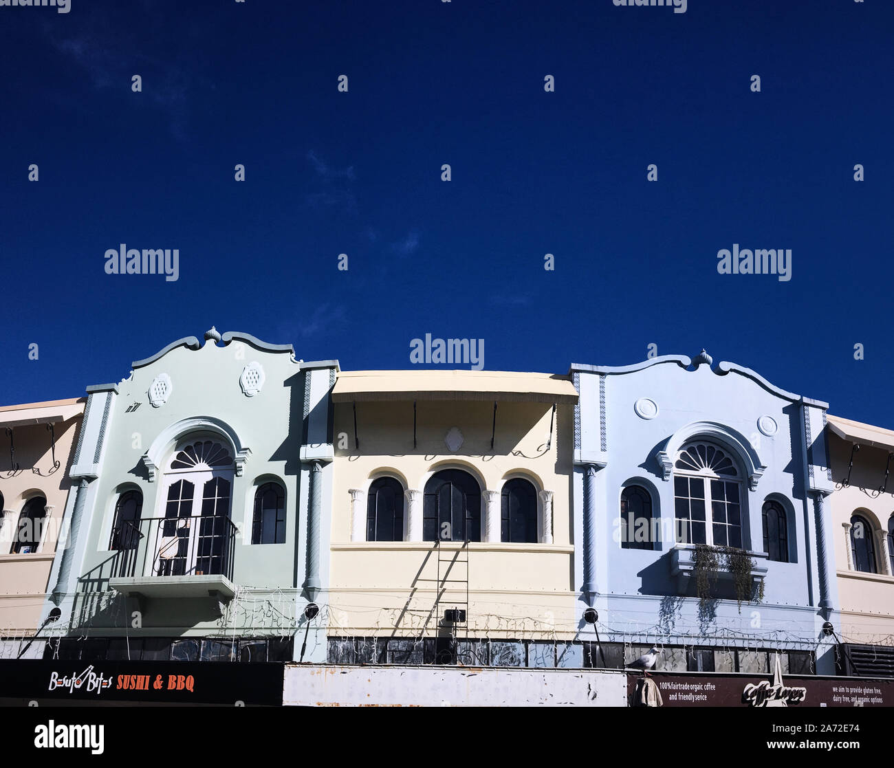 Die schönen pastellfarbenen alten historischen Gebäuden der Neue Regent Street, Christchurch, Neuseeland Stockfoto
