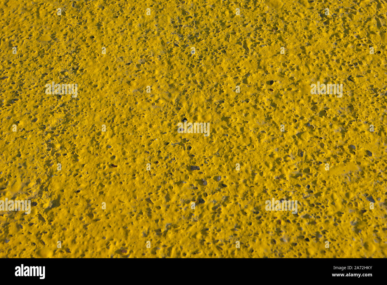 Hintergrund, Textur - Beton Wand, Gelb. Rauhe Oberfläche. Stockfoto